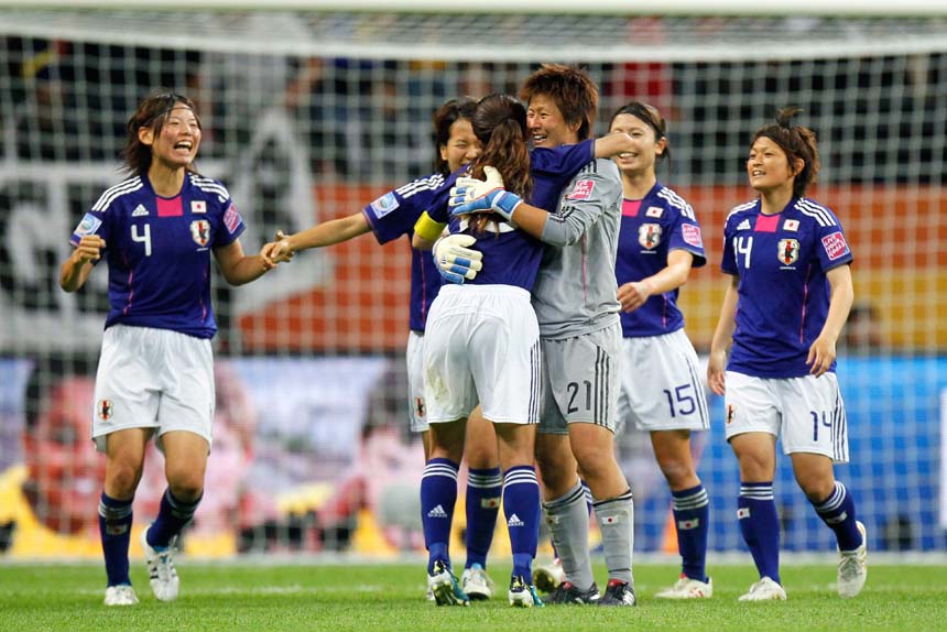 Japan celebrate their Semi-Final win over Sweden.